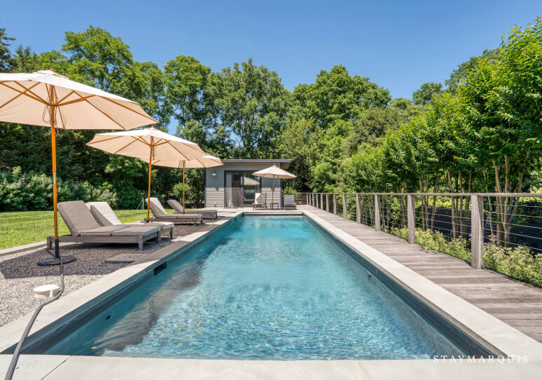 Pool view facing pool house